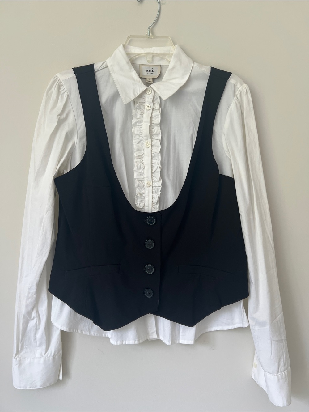 ECI Black Vest Layered Over White Ruffle-Front Button Shirt